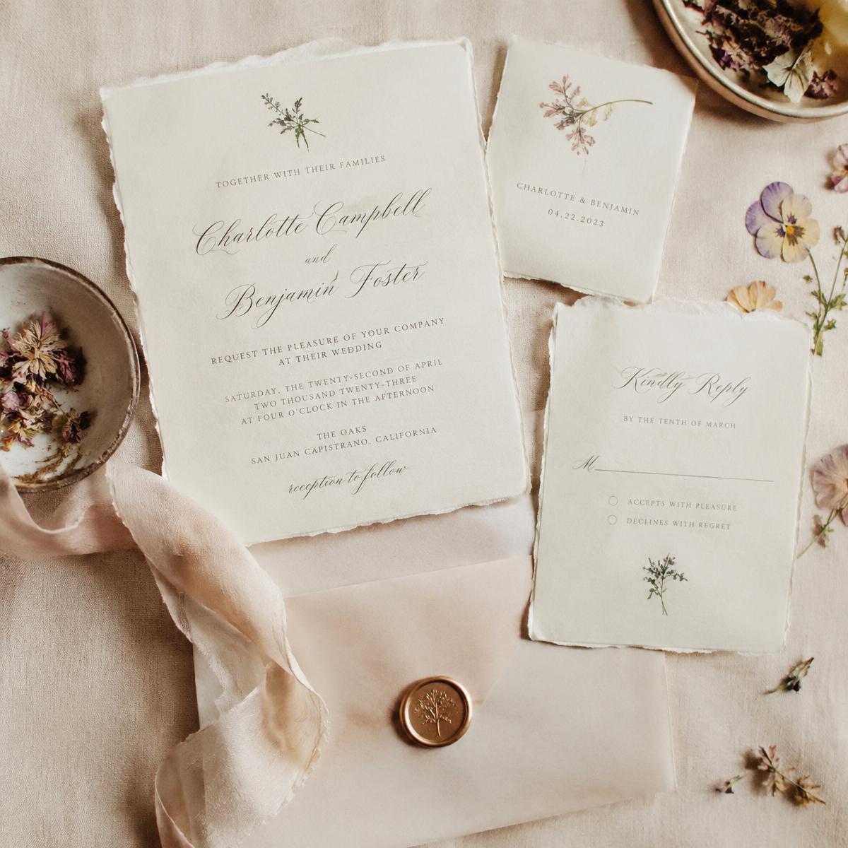 Wedding invitation suite on handmade paper with wax seal and silk ribbon